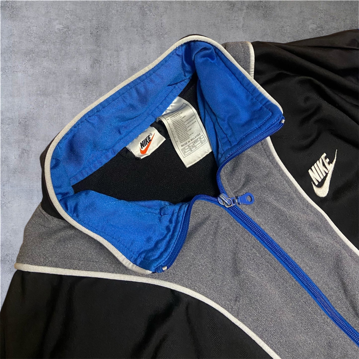 VINTAGE Nike 90s White Tag Zipper – Dunkelblau/Schwarz/Grau – Gr. XL (fittet wie M)